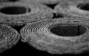 Stretford Court bitumen roof disadvantages